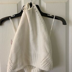 White crop top around the neck